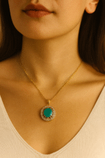 Golden flower locket with tuquiose stone