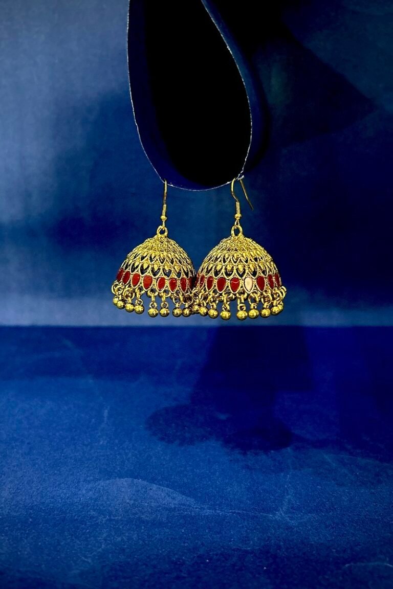 Dome-shaped jhumka style earrings adorned with small red stones accents and gold-toned bead dangles