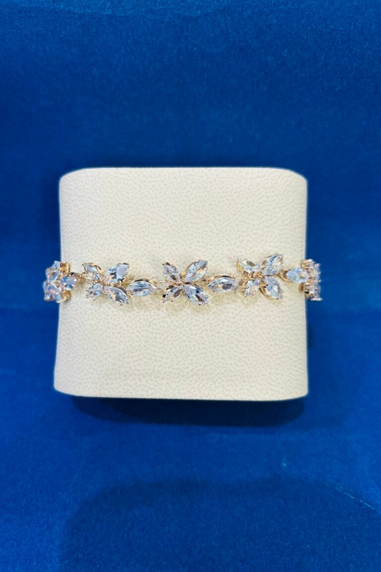 Golden chain bracelets with white leaf stone