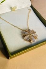 Golden heart large petal flower locket