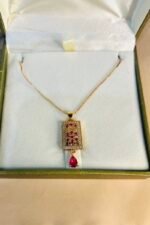 Golden rectangle shape locket with pink stone - Image 2