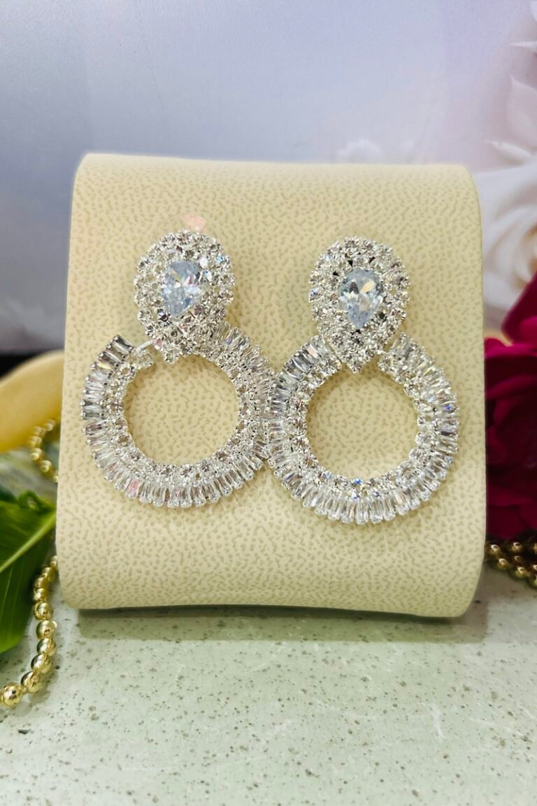 Silver round shape earrings with white stones