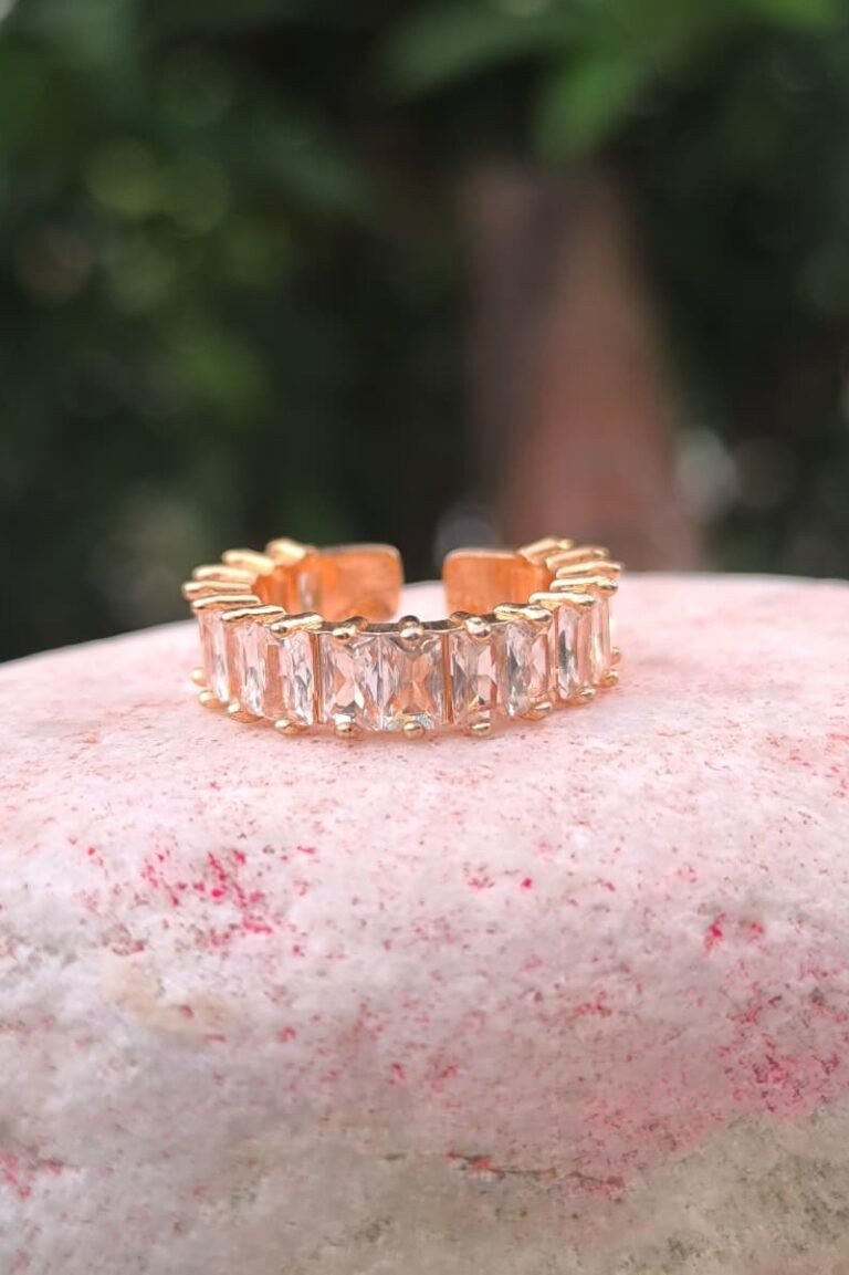 Golden ring with pink stone